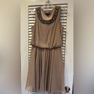 Tiana B. Elegant Sparkle Tan Midi Dress with Embellished Neckline